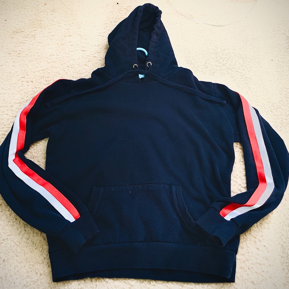 dark blue sweatshirt with red and white stripes